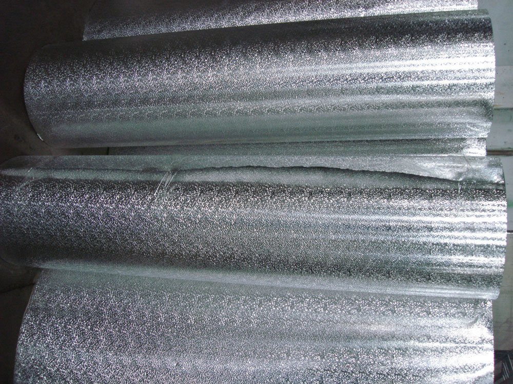 Polysurlyn moisture barrier stucco embossed aluminum coil